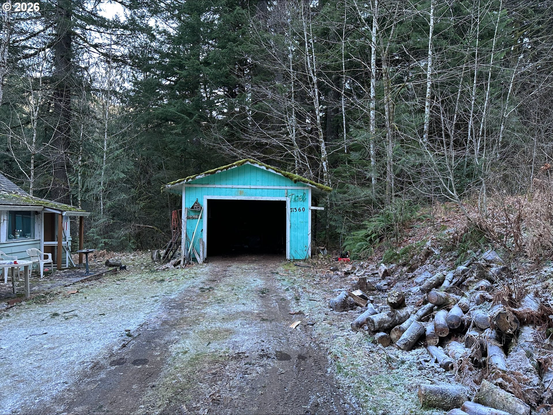 71360 East Jennie Lane Rhododendron, OR 97049 - Photo 4 of 19 a backyard of a house with seating space