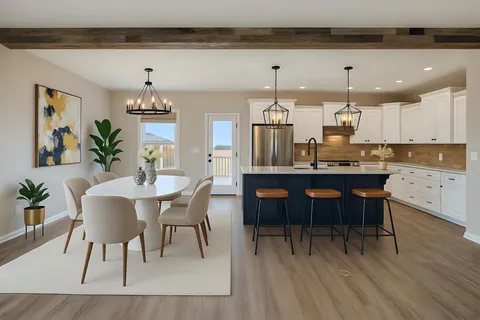 a kitchen with kitchen island a sink appliances and wooden floor