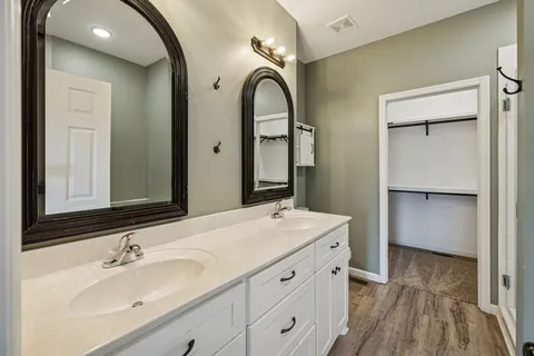 a view of a hallway with washer and dryer