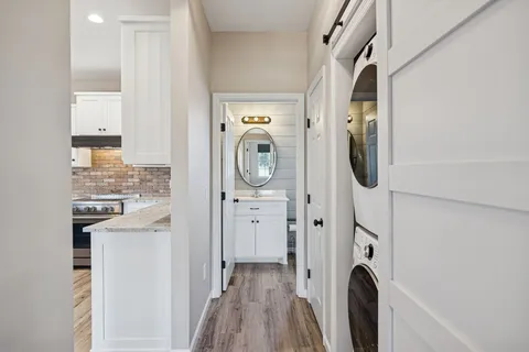 a view of an empty room with a ceiling fan