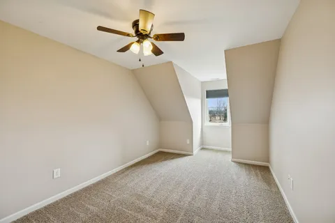 a swimming pool with outdoor seating and yard