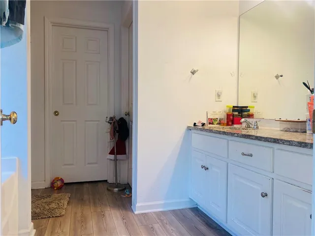 a kitchen with a sink and a window