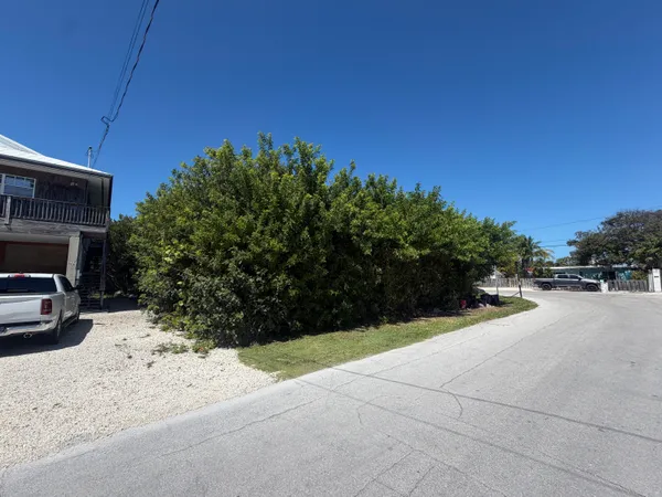 a view of a backyard of a house