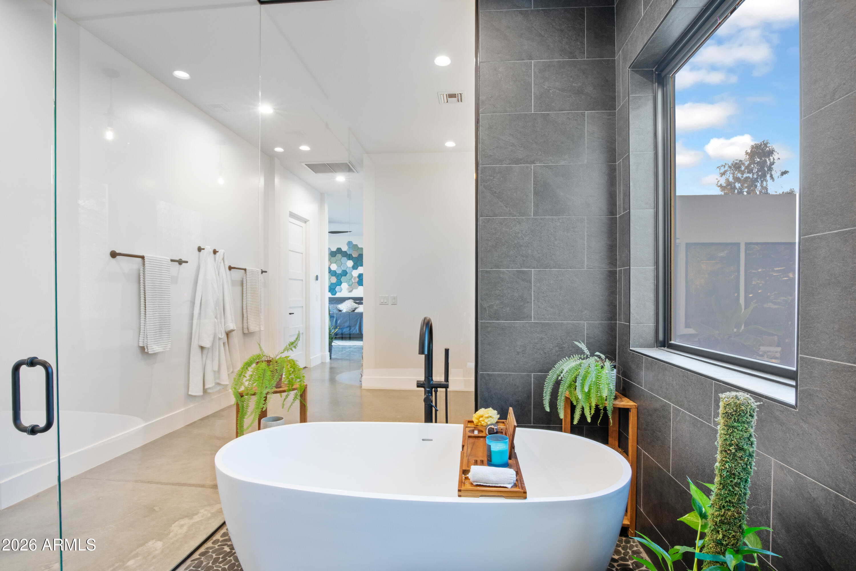129 East Water Tank Road Gilbert, AZ 85296 - Photo 22 of 48 a white bath tub sitting in a bathroom