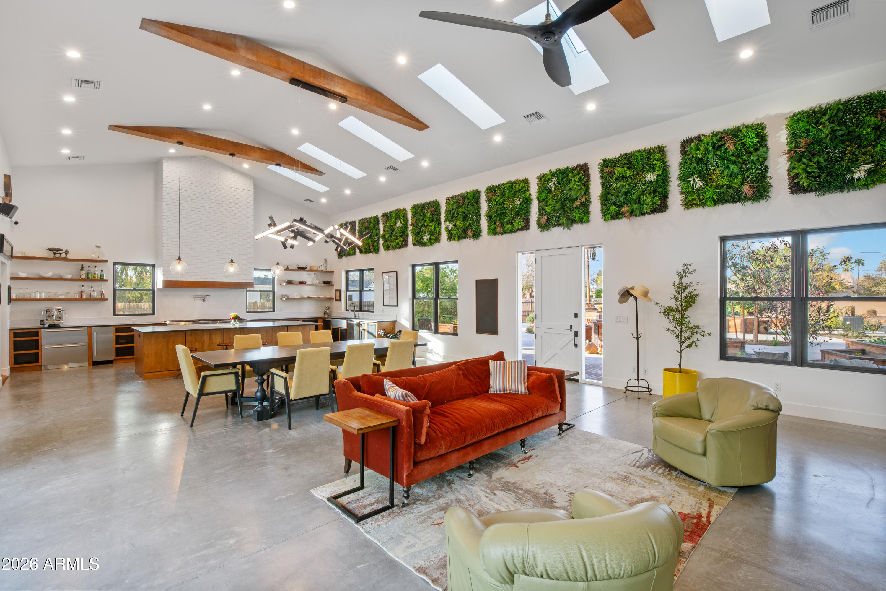 129 East Water Tank Road Gilbert, AZ 85296 - Photo 3 of 48 a living room with furniture and a large window