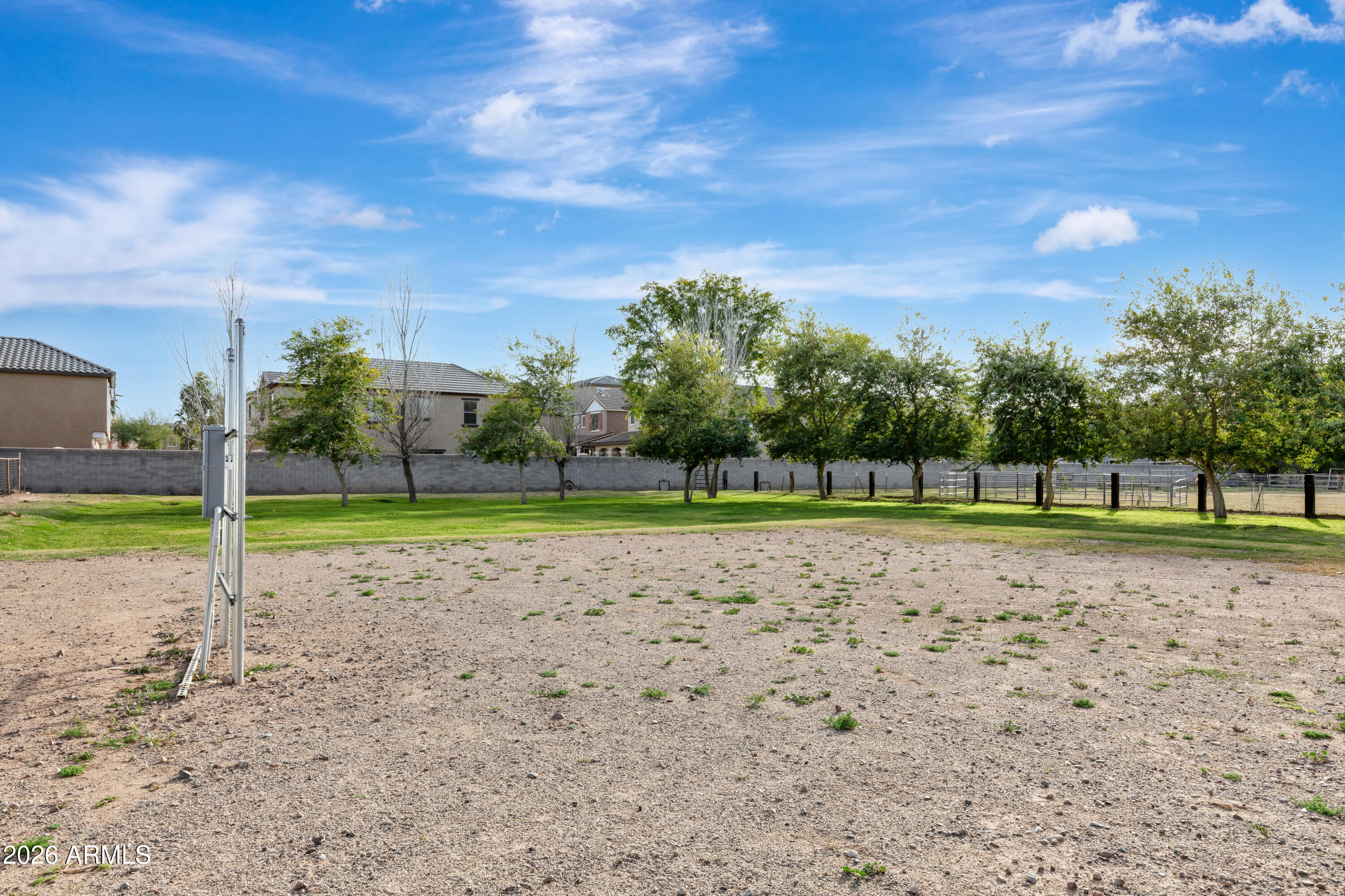 129 East Water Tank Road Gilbert, AZ 85296 - Photo 46 of 48 a view of a tennis ground with large trees