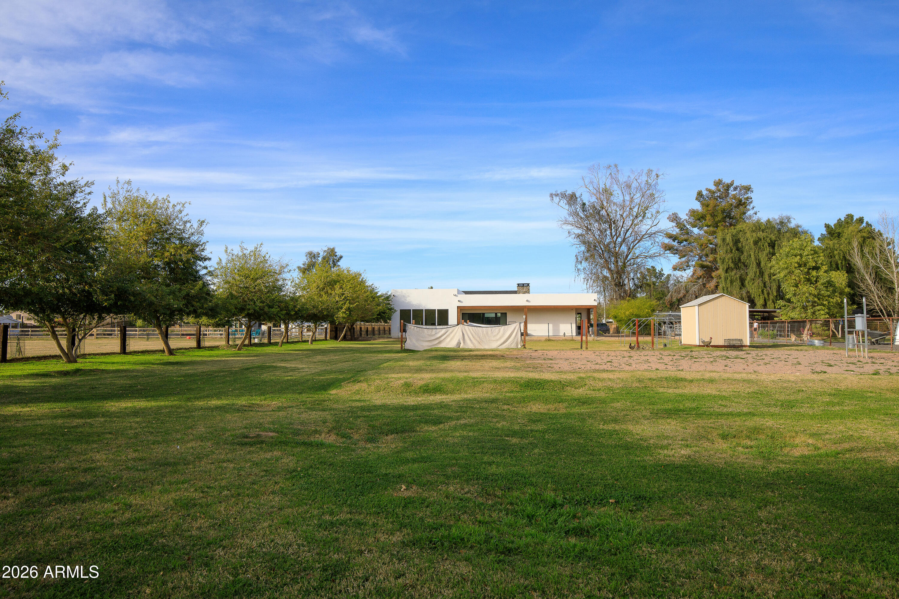 129 East Water Tank Road Gilbert, AZ 85296 - Photo 48 of 48 a front view of a house with a yard