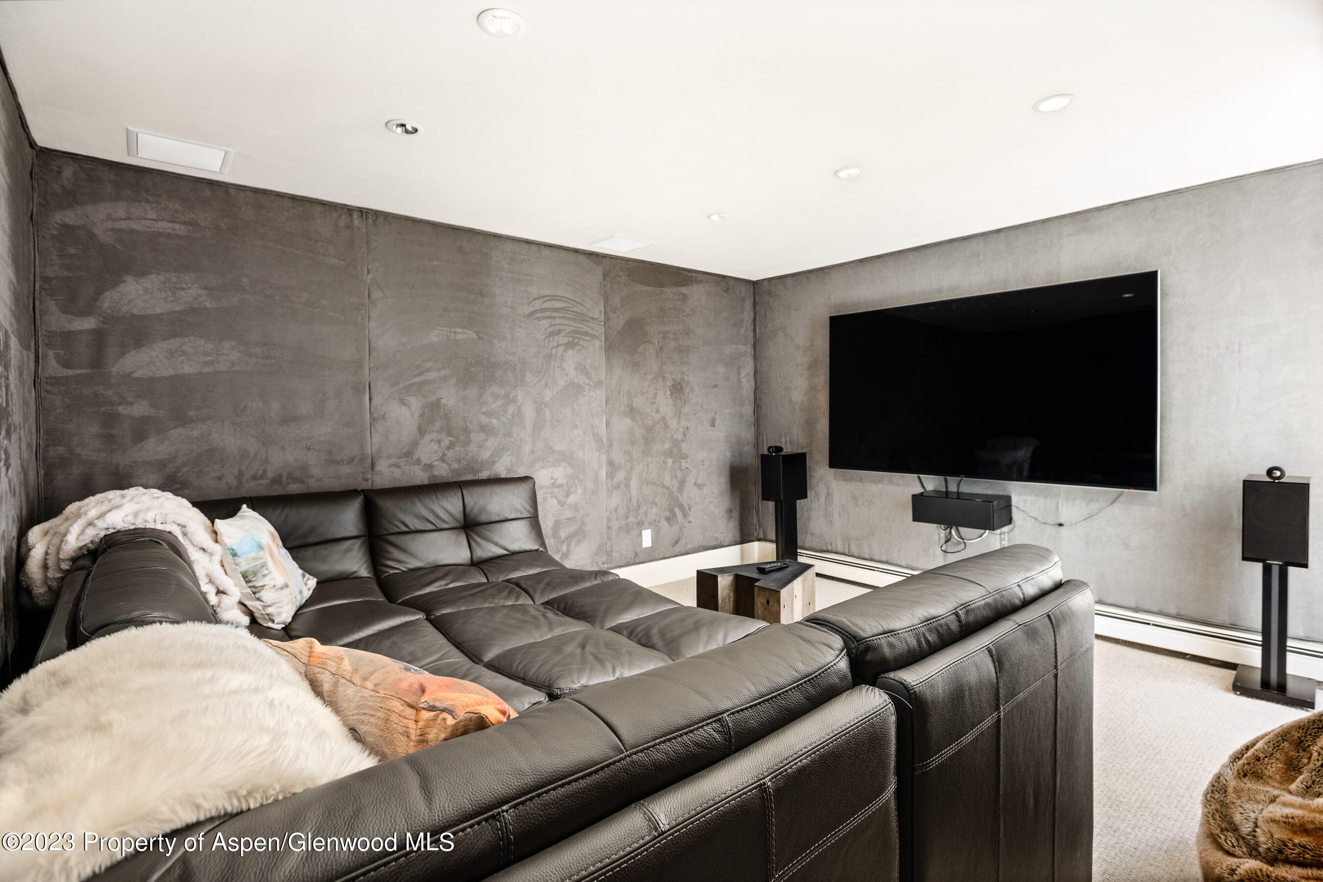 602 Mountain Laurel Drive Aspen, CO 81611 - Photo 16 of 23 a living room with furniture and a flat screen tv