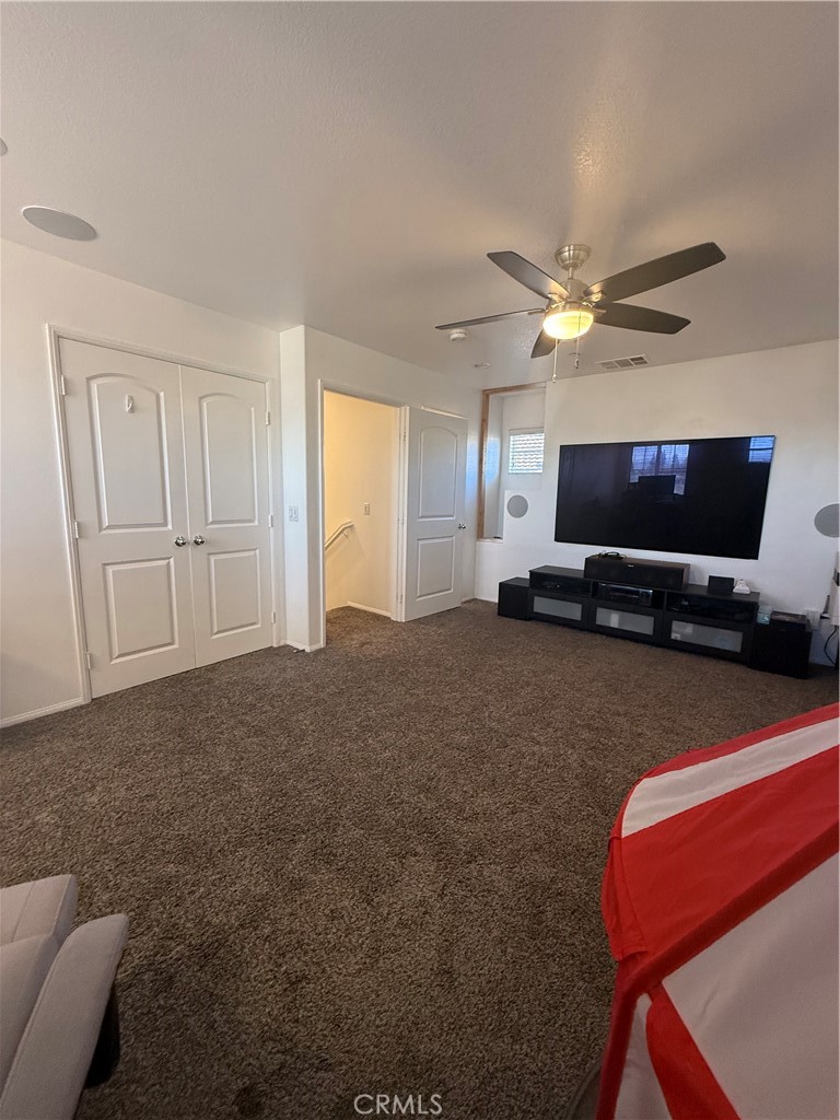 8041 City View Place Rancho Cucamonga, CA 91730 - Photo 20 of 21 a living room with furniture and a flat screen tv