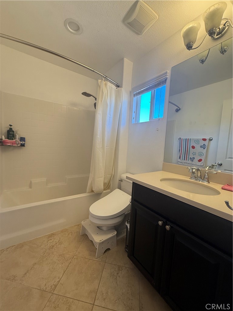 8041 City View Place Rancho Cucamonga, CA 91730 - Photo 21 of 21 a bathroom with a sink a toilet and shower