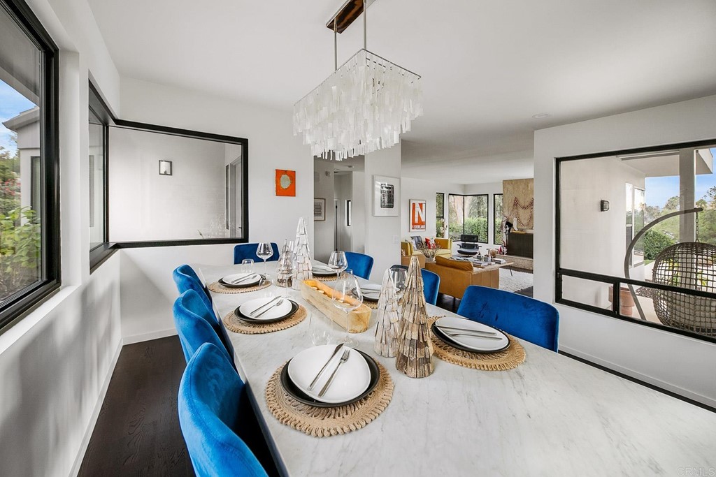 3095 Colley Lane Escondido, CA 92025 - Photo 11 of 51 a view of a dining room with furniture window and wooden floor