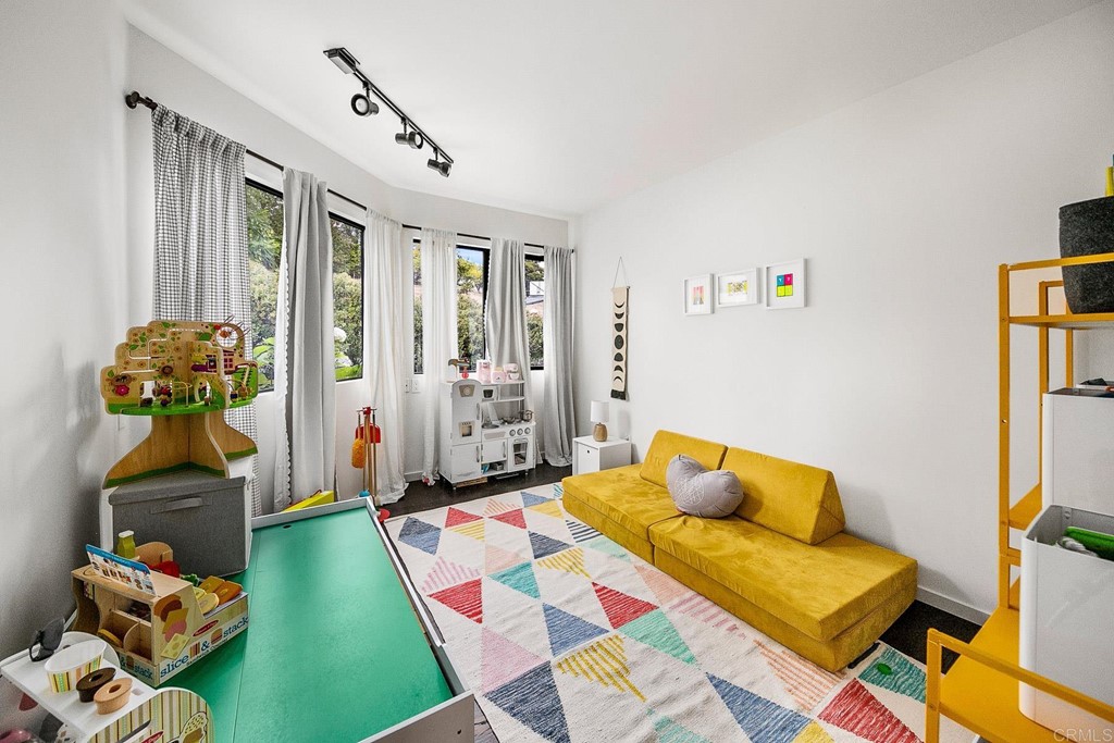 3095 Colley Lane Escondido, CA 92025 - Photo 22 of 51 a bedroom with a bed and a couch