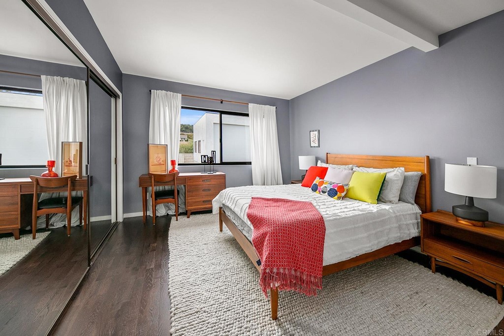 3095 Colley Lane Escondido, CA 92025 - Photo 26 of 51 a bedroom with a bed and wooden floor