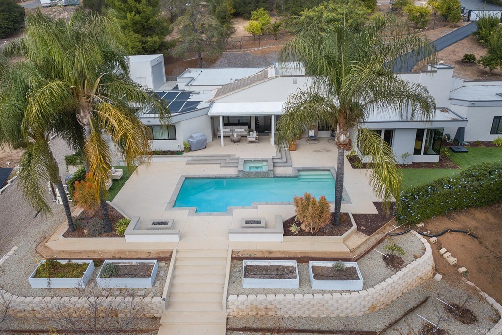 3095 Colley Lane Escondido, CA 92025 - Photo 43 of 51 a front view of a house with swimming pool