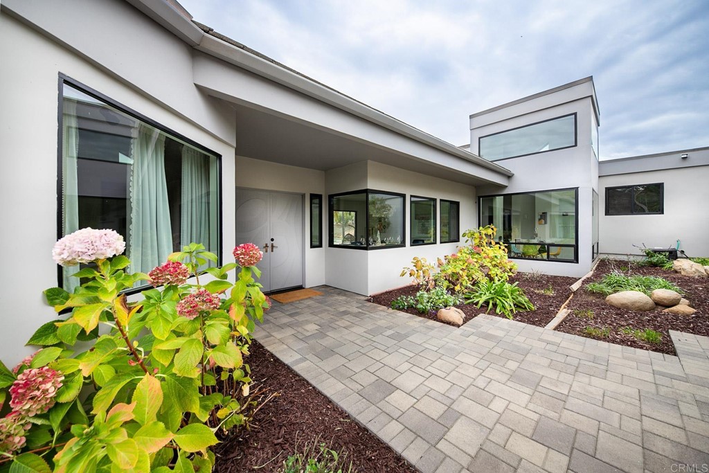 3095 Colley Lane Escondido, CA 92025 - Photo 5 of 51 a front view of a house having fountain