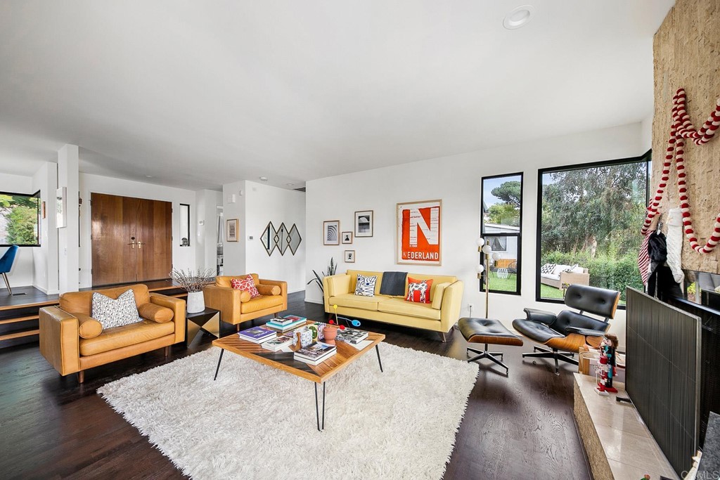 3095 Colley Lane Escondido, CA 92025 - Photo 8 of 51 a living room with furniture a rug and a large window