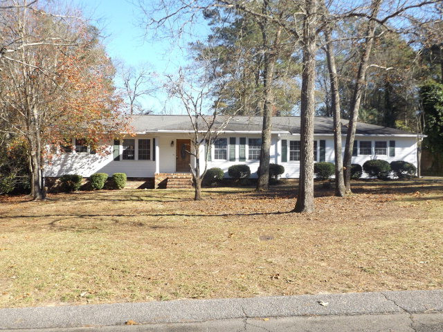 720 Oriole Street Aiken, SC 29803 - Photo 1 of 1 a view of a house with a yard covered in snow