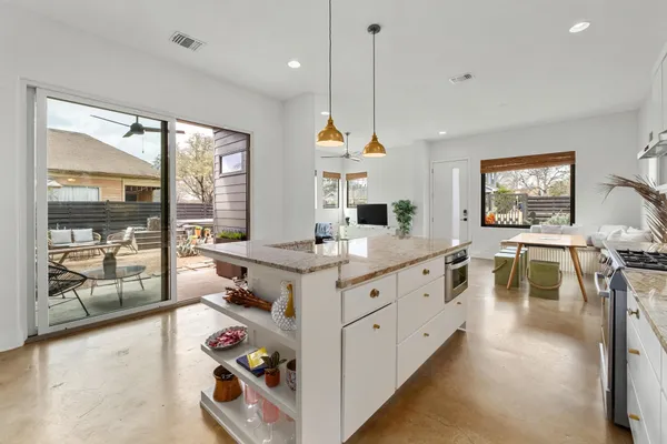 a kitchen with counter top space and a stove