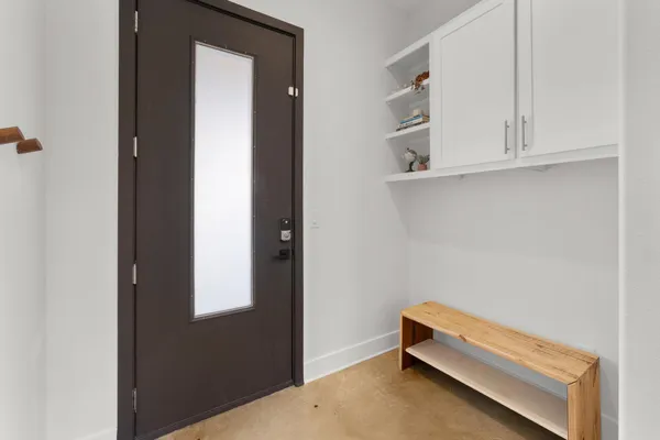 a living room with furniture and window