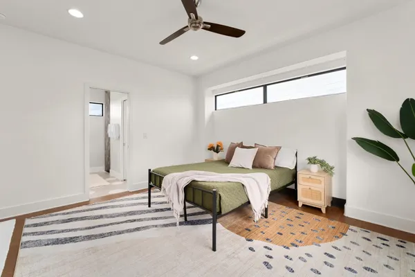 a bedroom with a bed and furniture