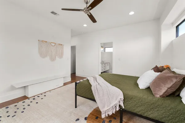 a bathroom with a double vanity sink and mirror