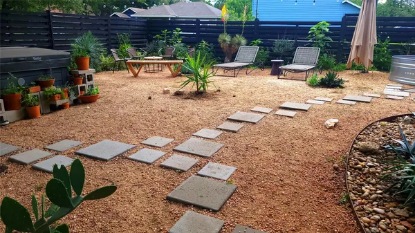 a picture of a room with a white wall and a picture