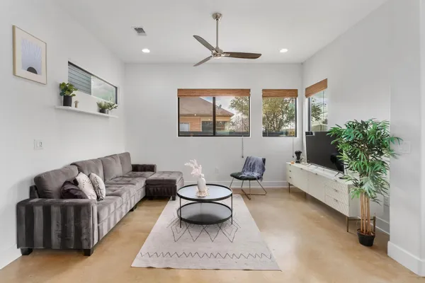 a kitchen with stainless steel appliances granite countertop a stove and a sink
