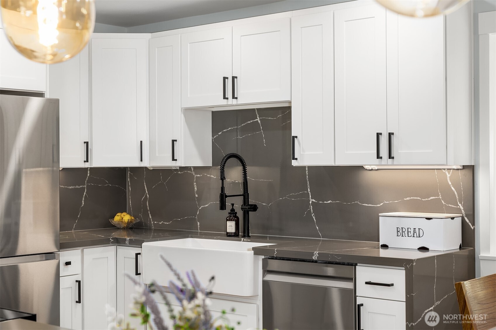 7245 Northeast 170th Street Kenmore, WA 98028 - Photo 16 of 35 a kitchen with a sink and cabinets
