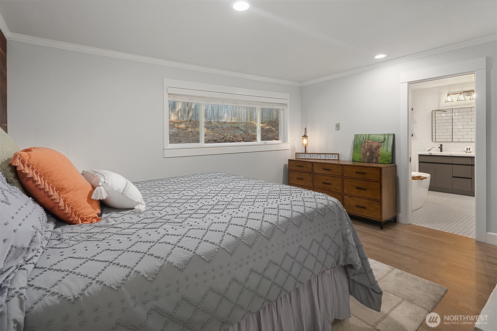 7245 Northeast 170th Street Kenmore, WA 98028 - Photo 19 of 35 a bedroom with a bed and a dresser