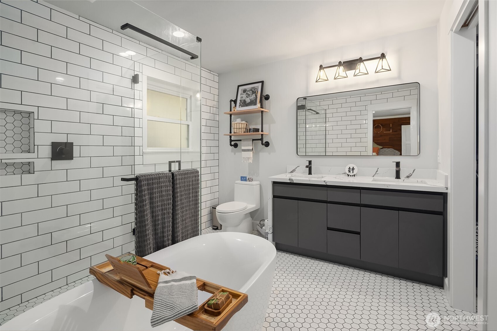 7245 Northeast 170th Street Kenmore, WA 98028 - Photo 21 of 35 a bathroom with a double vanity sink mirror and bathtub