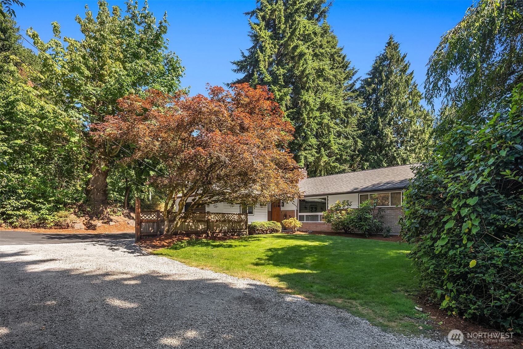 7245 Northeast 170th Street Kenmore, WA 98028 - Photo 34 of 35 a view of a house with garden