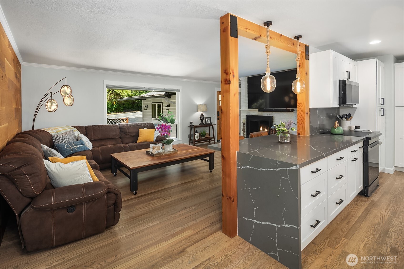 7245 Northeast 170th Street Kenmore, WA 98028 - Photo 7 of 35 a living room with furniture and a large window