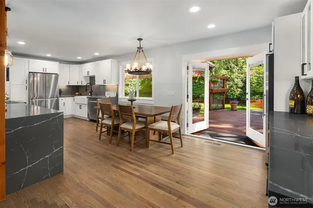 a view of a dining room with furniture window and outside view