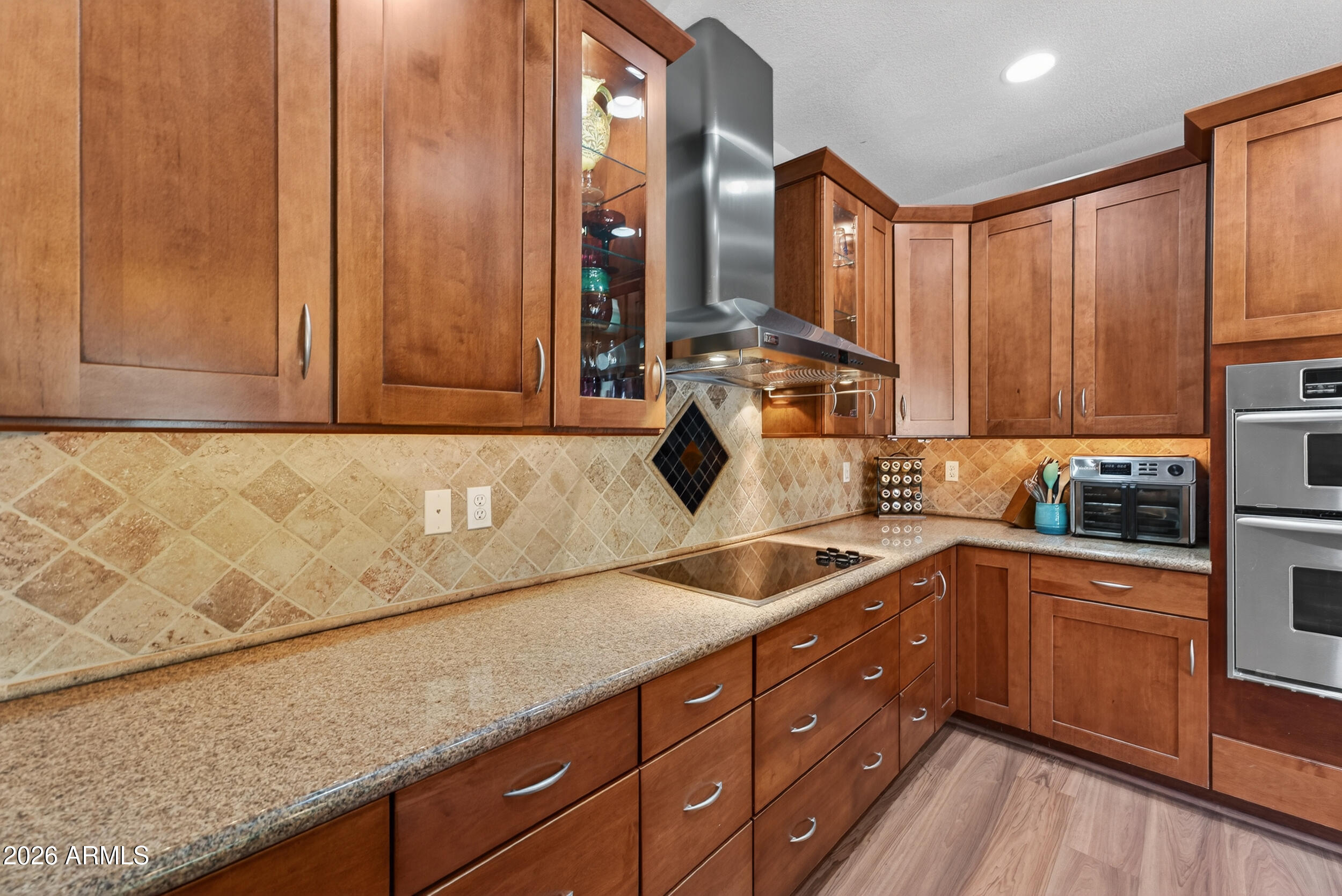 1539 East Winged Foot Road Phoenix, AZ 85022 - Photo 23 of 64 a kitchen with a sink and cabinets
