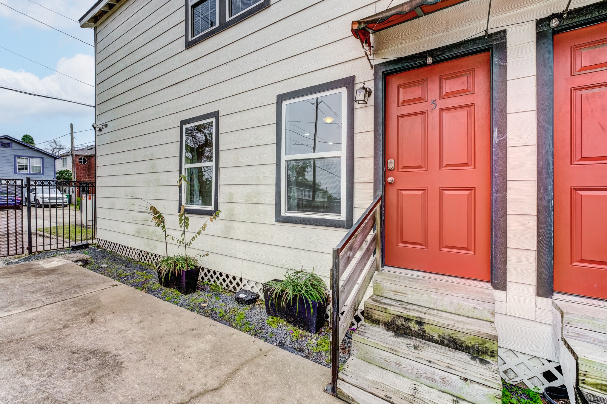 2720 Truxillo Street, Unit 5 Houston, TX 77004 - Photo 21 of 30 a front view of a house with a garage