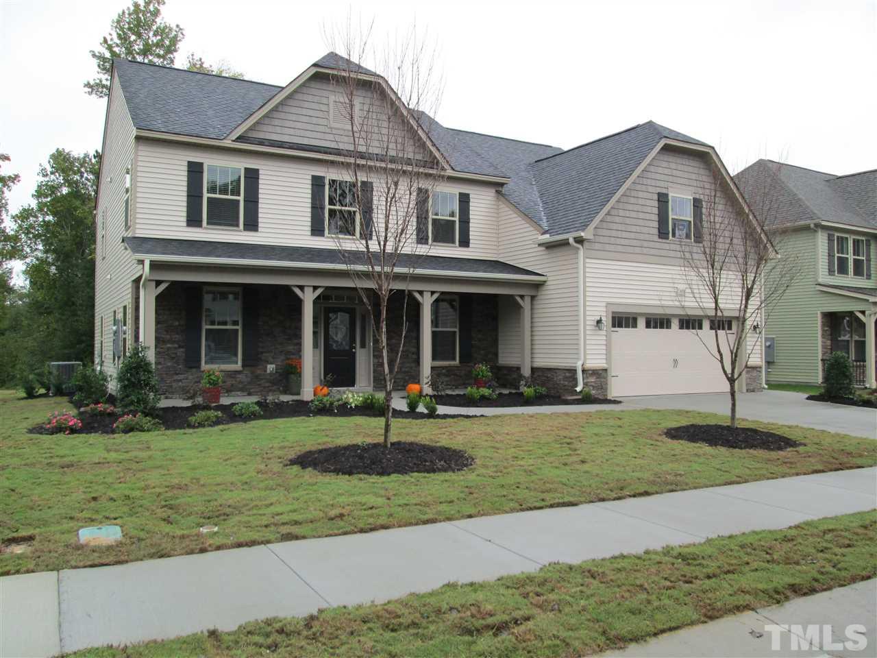 3438 Grosbeak Way Raleigh, NC 27616 - Photo 1 of 19 a front view of a house with a yard