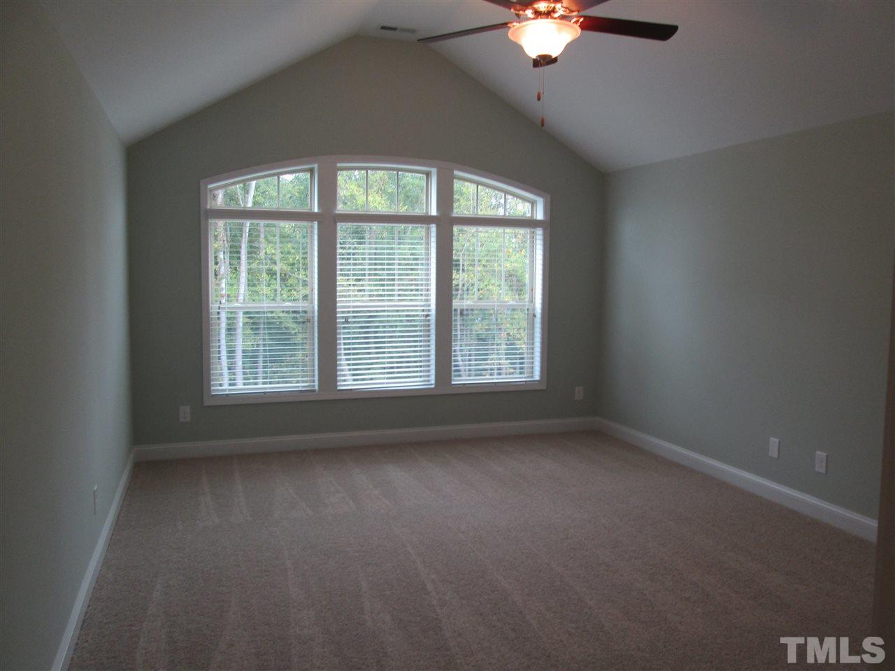 3438 Grosbeak Way Raleigh, NC 27616 - Photo 11 of 19 an empty room with a window