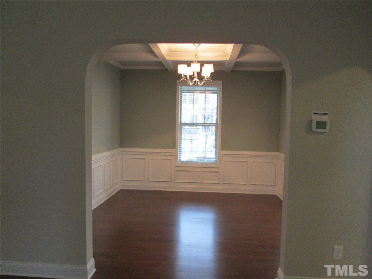 3438 Grosbeak Way Raleigh, NC 27616 - Photo 5 of 19 a view of wooden floor and windows in a room