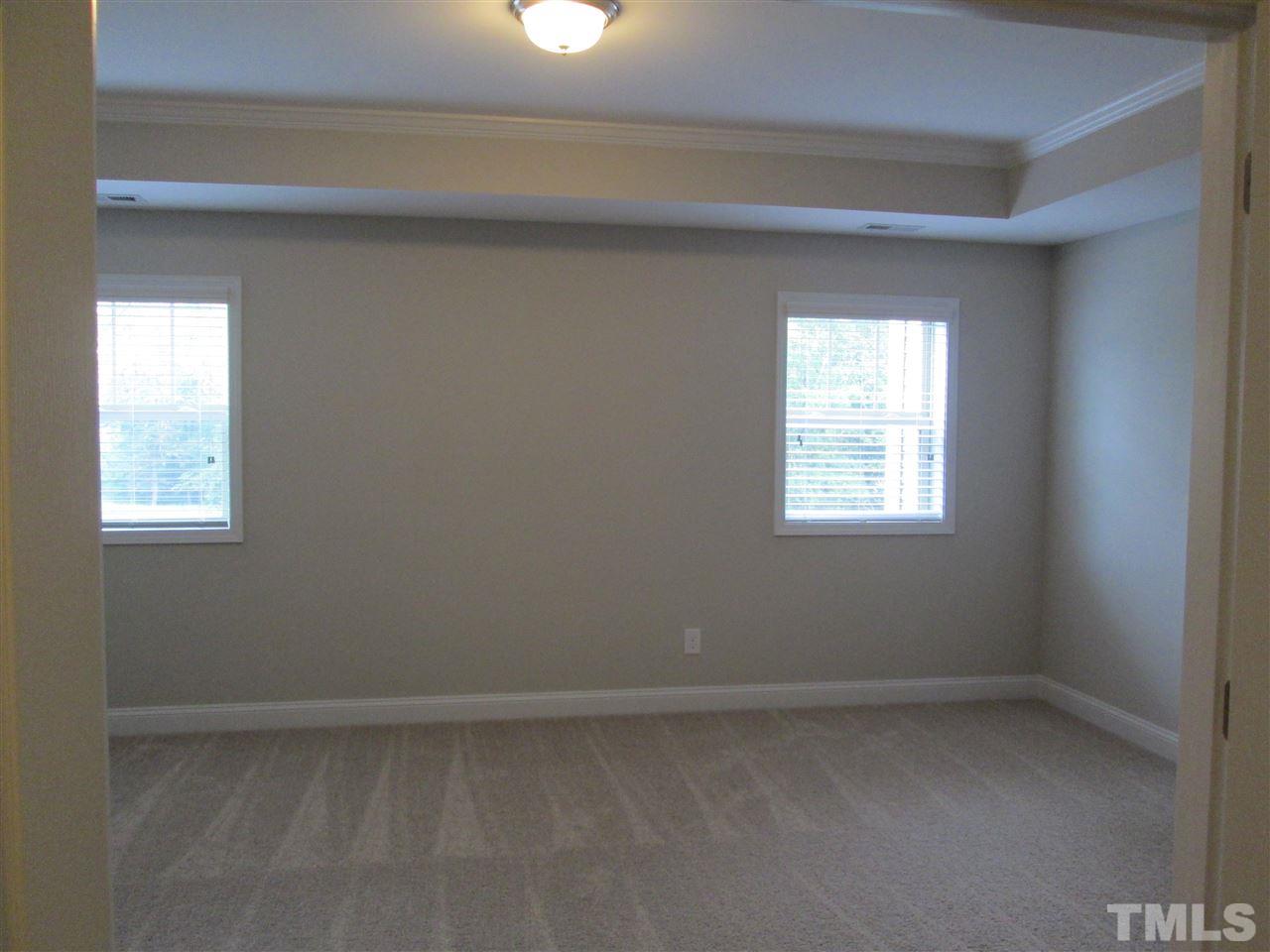 3438 Grosbeak Way Raleigh, NC 27616 - Photo 9 of 19 a room that has a window in it