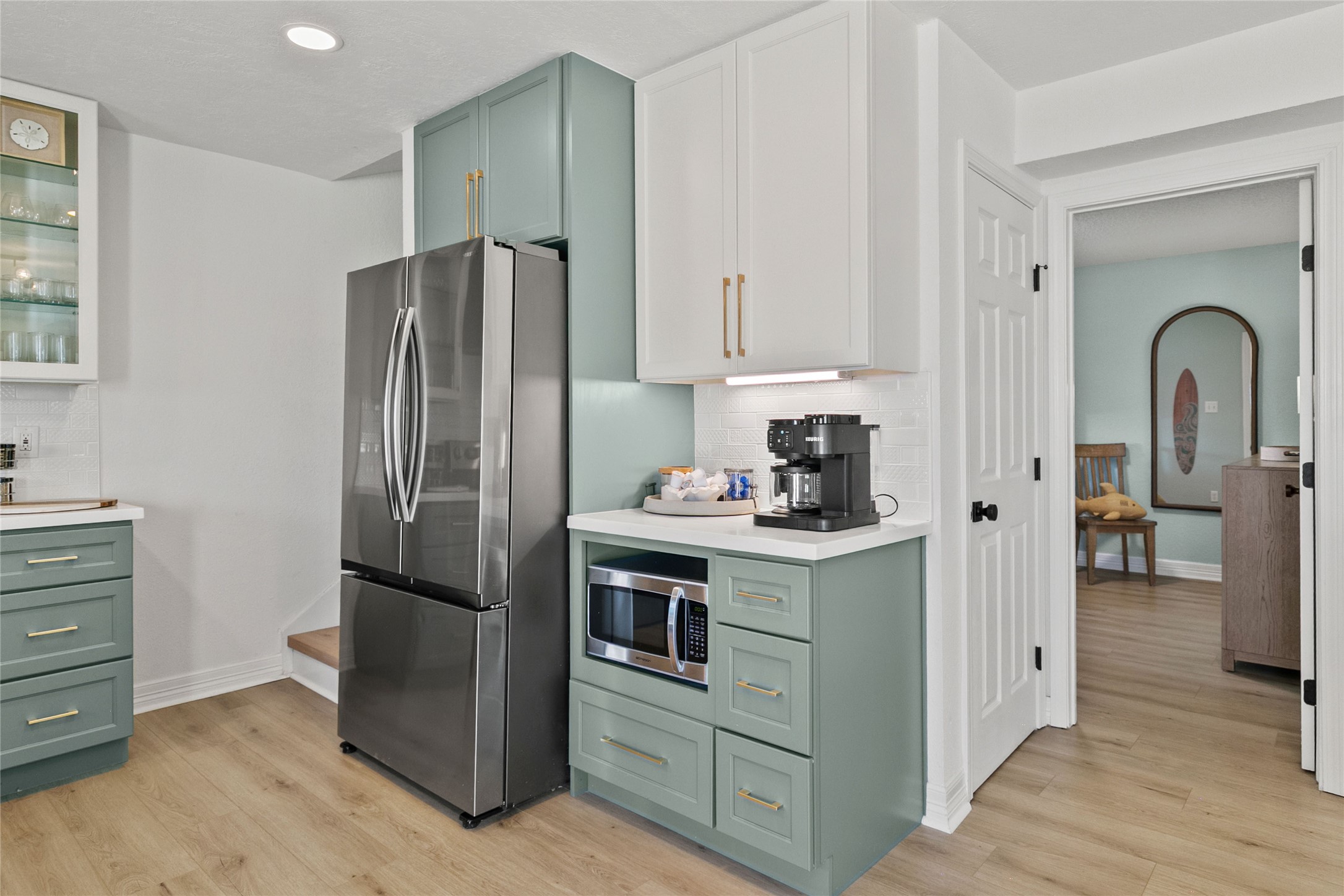 1213 Sargasso Circle Surfside Beach, TX 77541 - Photo 13 of 40 a kitchen with stainless steel appliances granite countertop a refrigerator and a stove