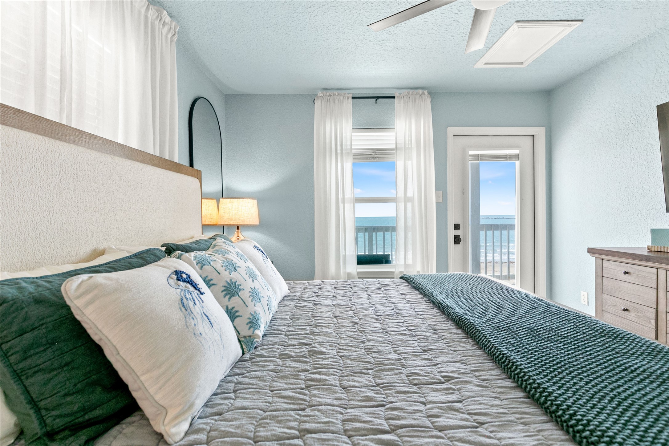 1213 Sargasso Circle Surfside Beach, TX 77541 - Photo 21 of 40 a bedroom with a bed and a window