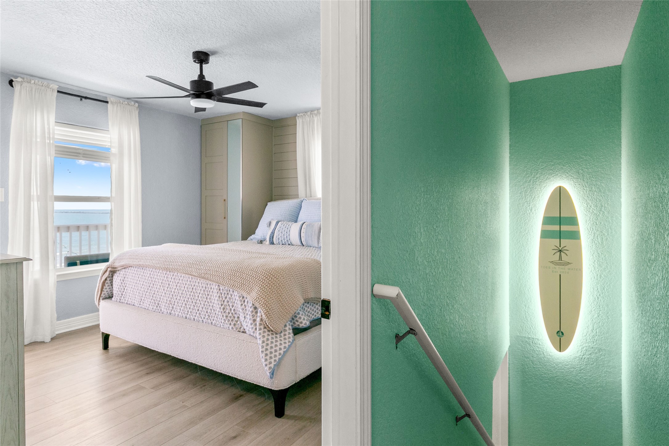 1213 Sargasso Circle Surfside Beach, TX 77541 - Photo 26 of 40 a bedroom with a bed and a mirror
