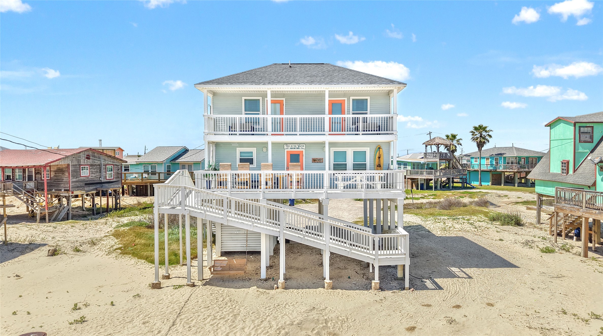 1213 Sargasso Circle Surfside Beach, TX 77541 - Photo 40 of 40 a view of a house with a swimming pool