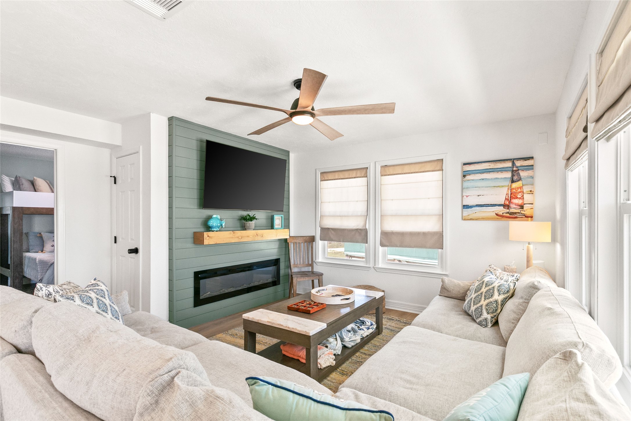 1213 Sargasso Circle Surfside Beach, TX 77541 - Photo 5 of 40 a bedroom with furniture and a window