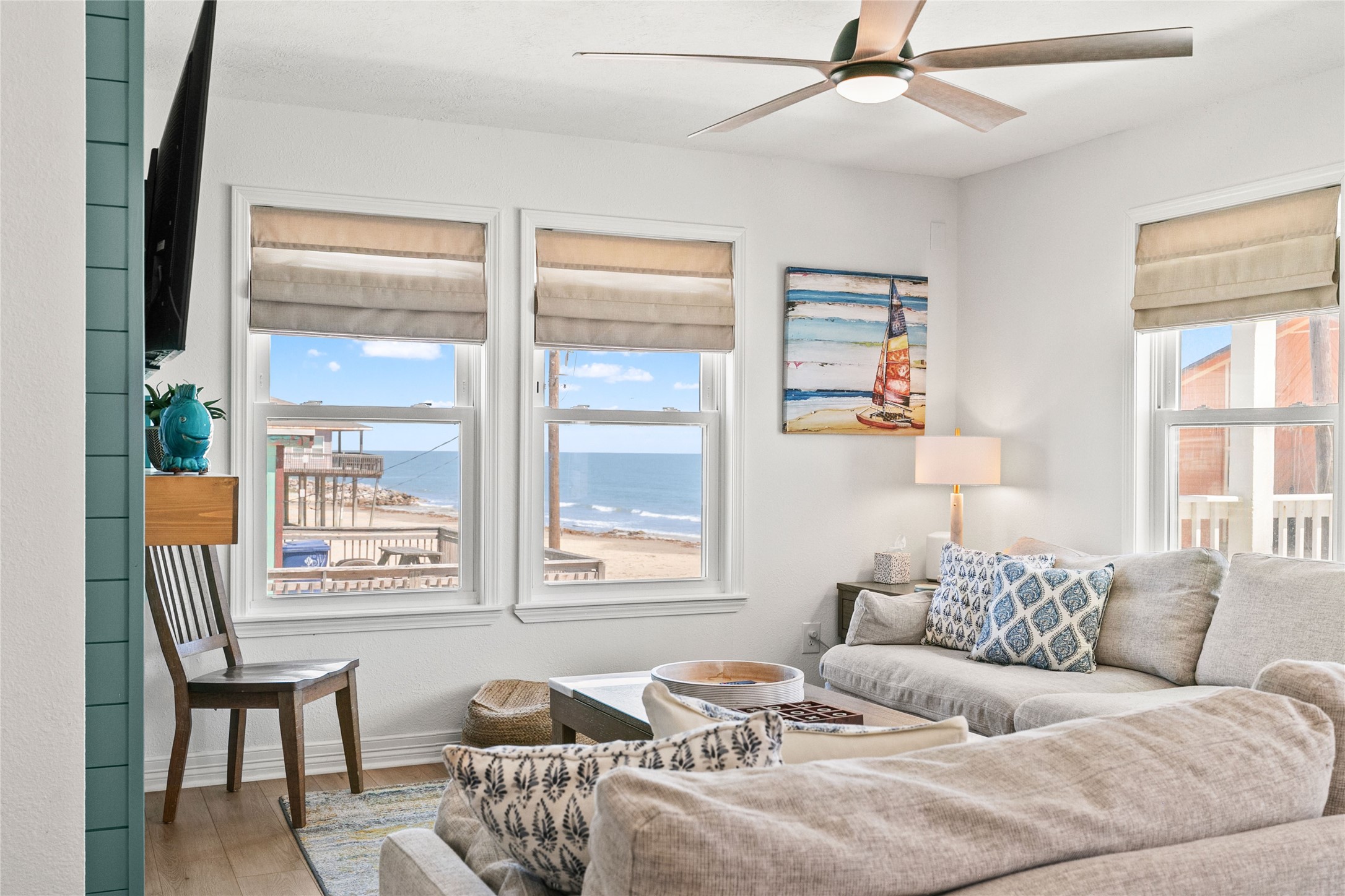 1213 Sargasso Circle Surfside Beach, TX 77541 - Photo 6 of 40 a living room with furniture and two window