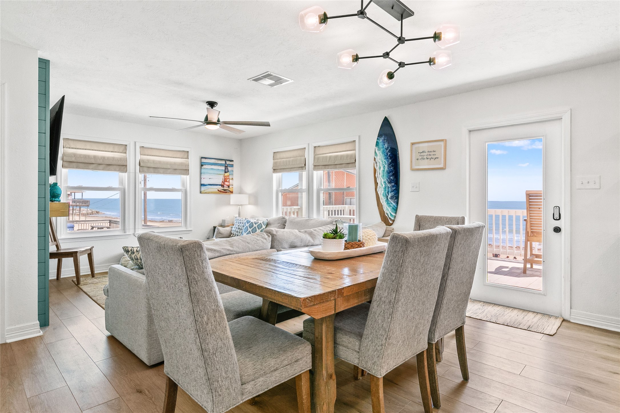 1213 Sargasso Circle Surfside Beach, TX 77541 - Photo 9 of 40 a view of a dining room with furniture window and wooden floor