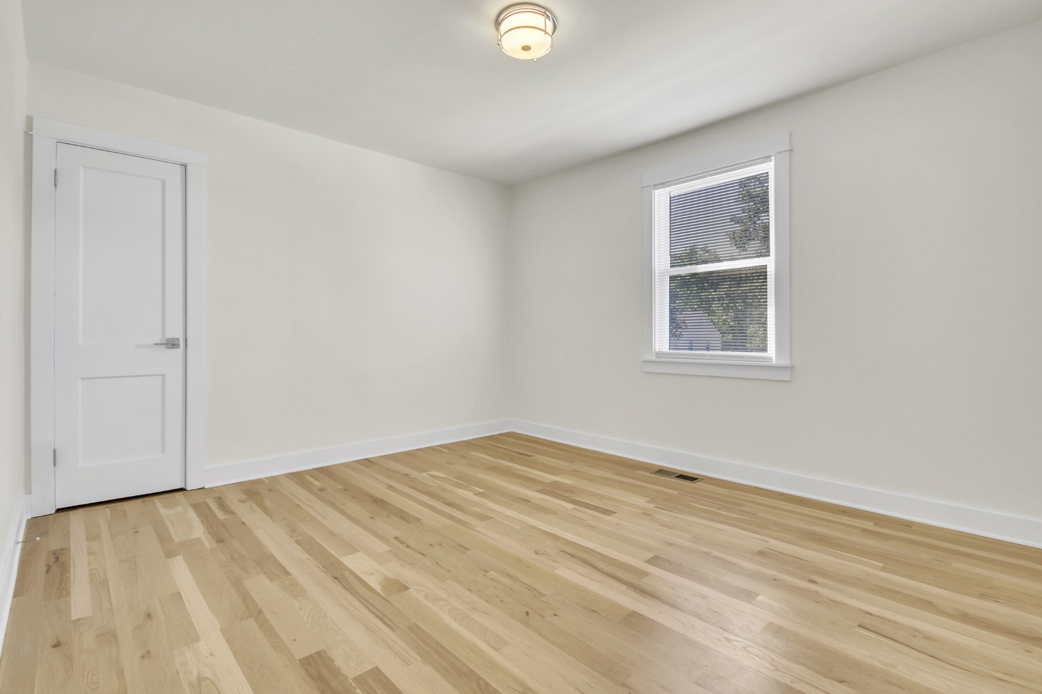 1121 Goldilocks Street Madison, TN 37115 - Photo 16 of 31 a view of empty room with wooden floor and fan