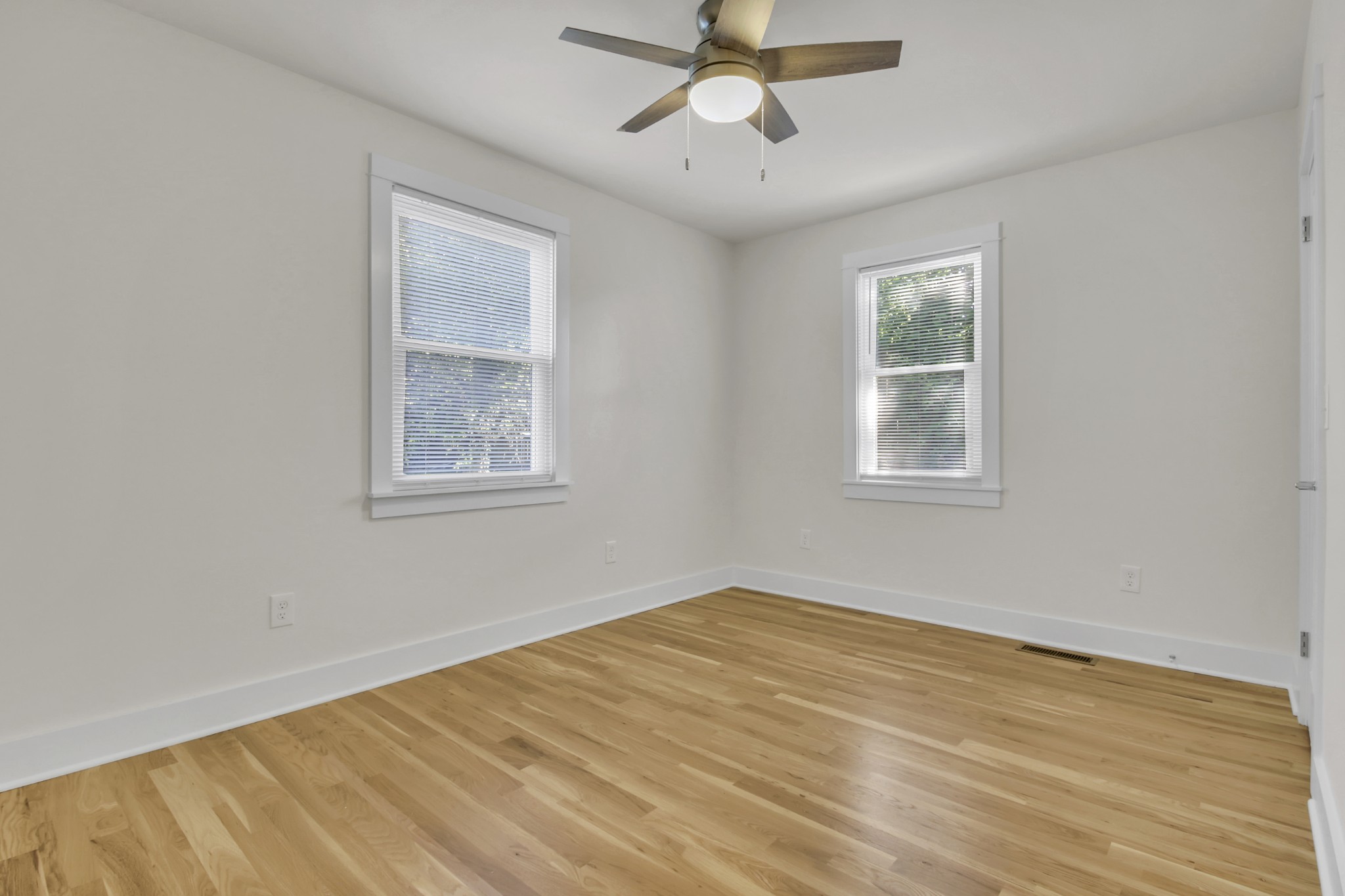 1121 Goldilocks Street Madison, TN 37115 - Photo 17 of 31 a view of empty room with wooden floor and fan