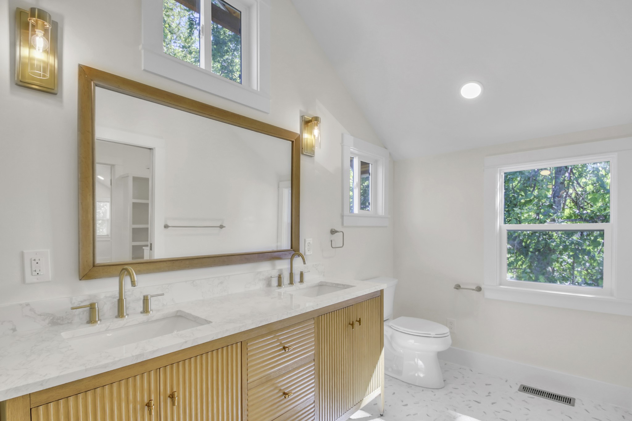 1121 Goldilocks Street Madison, TN 37115 - Photo 27 of 31 a bathroom with a granite countertop sink mirror and a toilet