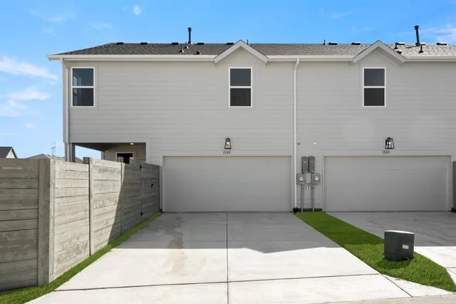 a view of a hallway with a white walls